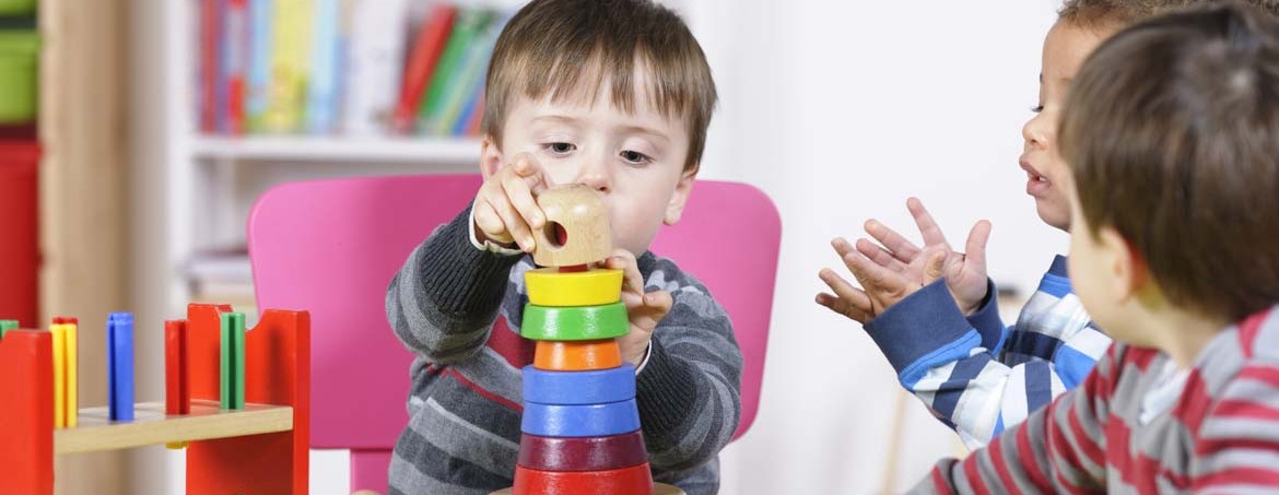 children playing with wooden toys