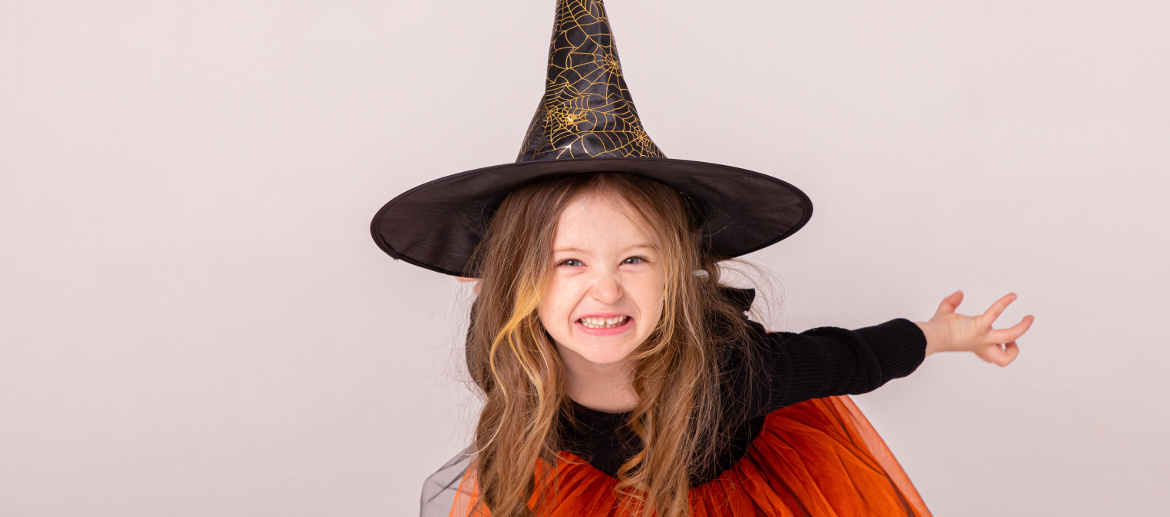 girl dressed as witch for Halloween