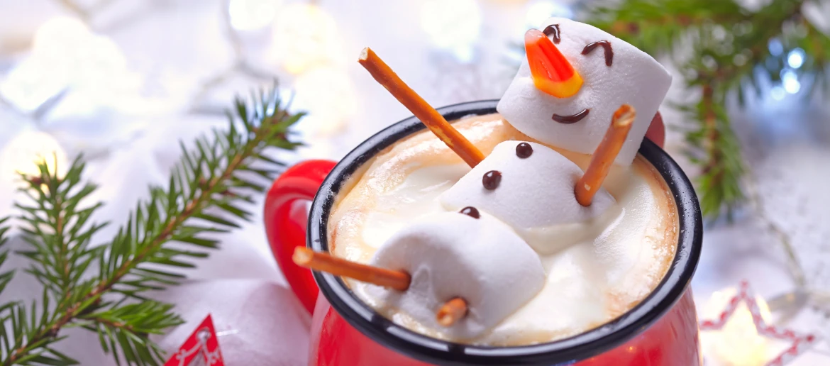 Marshmallow snowman in hot chocolate