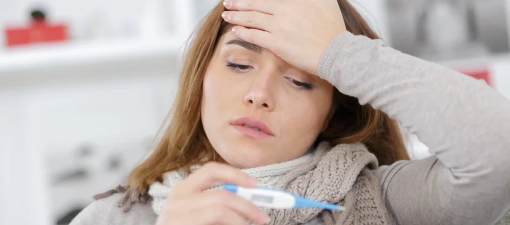 Young woman with high temperature